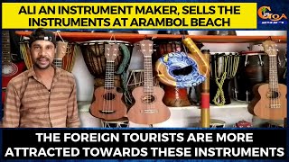 Ali an instrument maker, sells instruments at Arambol beach. Foreign tourists are more attracted