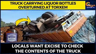 Truck carrying liquor bottles overturned at Torxem. Locals want excise to check the contents