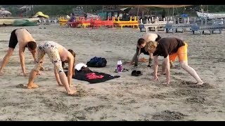 Foreigners practice Yoga at Yoga Village on Arambol beach!