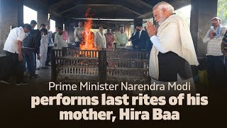 Prime Minister Narendra Modi performs last rites of his mother, Hira Baa