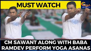 CM Sawant performs yoga asanas with Baba Ramdev at Miramar