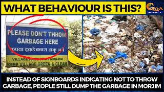 Instead of signboards indicating not to throw garbage, people still dump the garbage in Morjim
