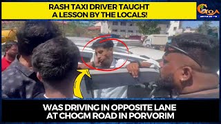 Rash taxi driver taught a lesson by the locals! Was driving in opp lane at Chogm Road in Porvorim