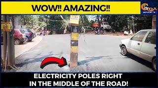 Electricity poles right in the middle of the road!