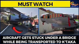 #MustWatch- Aircraft gets stuck under a bridge while being transported on a truck to Karnataka