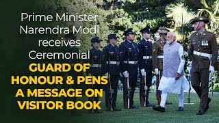 Prime Minister Narendra Modi receives Ceremonial Guard of Honour & pens a message on visitor book