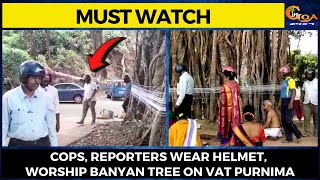 Cops, Reporters wear helmet, worship banyan tree on Vat Purnima.