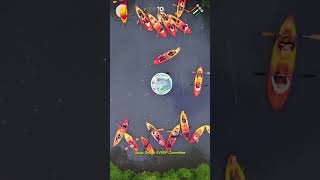 Breathtaking visuals of Kayaking boats that moved into a picturesque area in the middle of the river