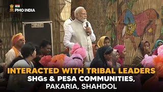 PM Modi interacts with tribal leaders, SHGs, PESA communities at Pakaria village in Shahdol, MP