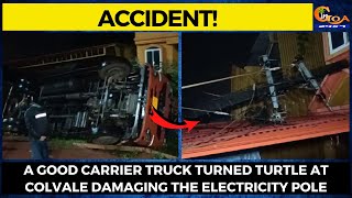 #Accident! A good carrier truck turned turtle at Colvale damaging the electricity pole.