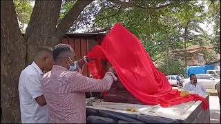 Forensics team dusting for finger prints on the vandalized statue of Chhatrapati Shivaji Maharaj