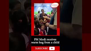 PM Modi receives warm hug from a child..#india #modi #shorts