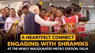 PM Narendra Modi interacts with Shramiks at the newly inaugurated Metro Station, Delhi