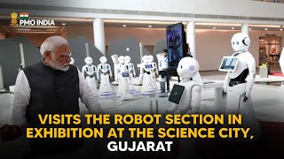 PM Narendra Modi visits the Robot section in exhibition at the Science City, Gujarat