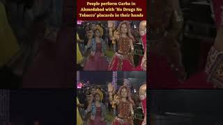 People perform Garba in Ahmedabad with ‘No Drugs No Tobacco’ placards in their hands | Janta Tv