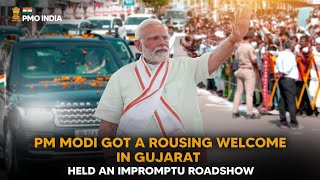 PM Modi gets a rousing welcome in Gujarat; holds an impromptu Roadshow