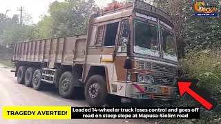 #TragedyAverted! Loaded 14-wheeler truck loses control and goes off road on steep slope