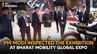 PM Modi inspects the exhibition at Bharat Mobility Global Expo at Bharat Mandapam