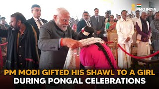 PM Modi gifts his shawl to a Girl during Pongal celebrations