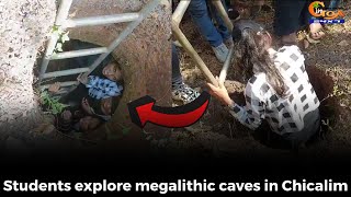 Students explore megalithic caves in Chicalim.