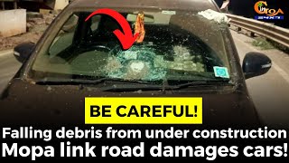 Falling debris: #BeCareful! Falling debris from under construction Mopa link road damages cars!