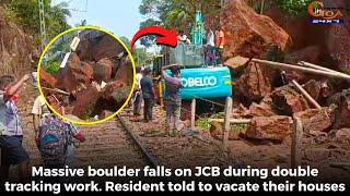 Massive boulder falls on JCB during double tracking work. Resident told to vacate their houses