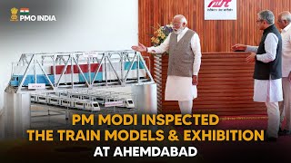 Prime Minister Narendra Modi inspects the train models & exhibition at Ahemdabad