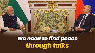 We need to find peace through talks: PM Modi