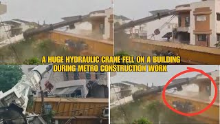 Ek Badi Hydraulic Crane Giri Ghar Par Metro Train Ke Kaam Ke Dauran in Nana Varachha, Surat, Gujarat