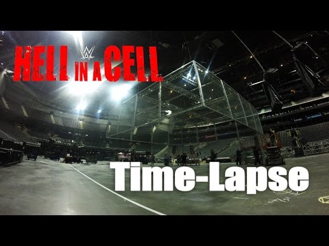 Watch a time-lapse video of the construction of the infamous Hell in a Cell - WWE Wrestling Video