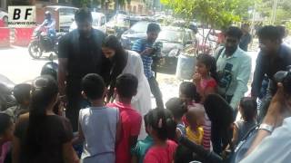 Poonam Pandey Doing Social Work - Distributing Raincourt To Poor Kids - Must Watch