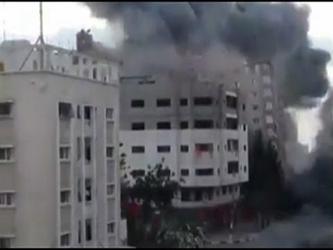 Raw- Building Collapses After Gaza Airstrike News Video