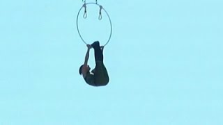 Raw: Wallenda Wife Hangs by Feet From Chopper