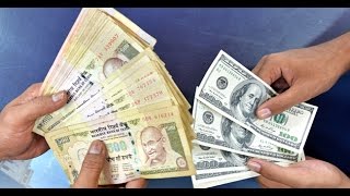 Rupee down 23 paise to fresh 30-month low against USD
