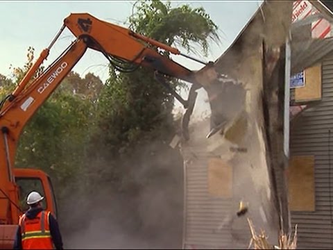 Raw- Home Where Infants' Bodies Found Torn Down News Video