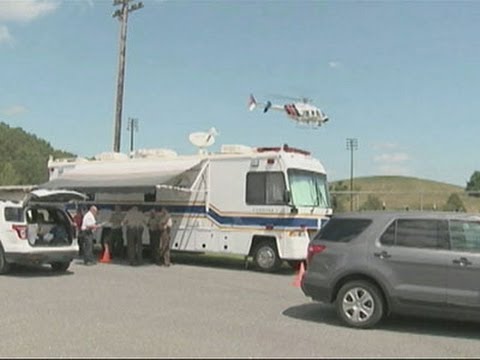 Raw- Emergency Crews Arrive at Jet Crash Scene News Video