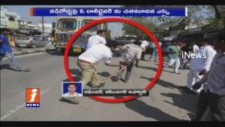 Traffic SI Lingamurthy Beats Lorry Driver on Road in Rajanna Sircilla District | iNews