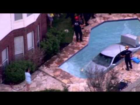 Raw- Car Crashes Into San Antonio Pool News Video