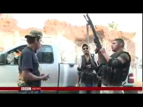 Mexico vigilantes take cartel town News Video
