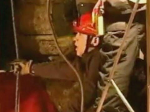 Raw- Texas Man Rescued From Concrete Mix Pit News Video