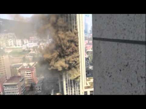 Raw- Fire Engulfs Tower Block in China News Video