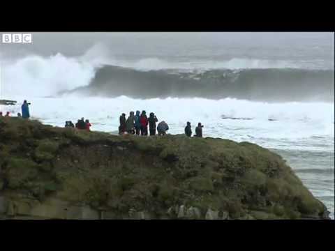 Surfers flock to ride the "black swell" in Ireland News Video