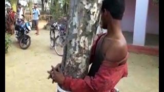 ग्रामीणों ने चोर की पिटाई कर पेड़ से बांधा